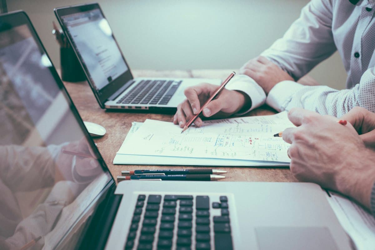Operations team working with AI to streamline processes and reporting